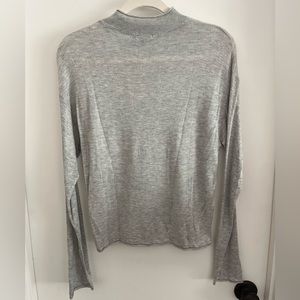 Tissue Thin Sheer Turtleneck. Slight dolman sleeve.